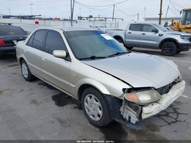  Salvage Mazda Protege